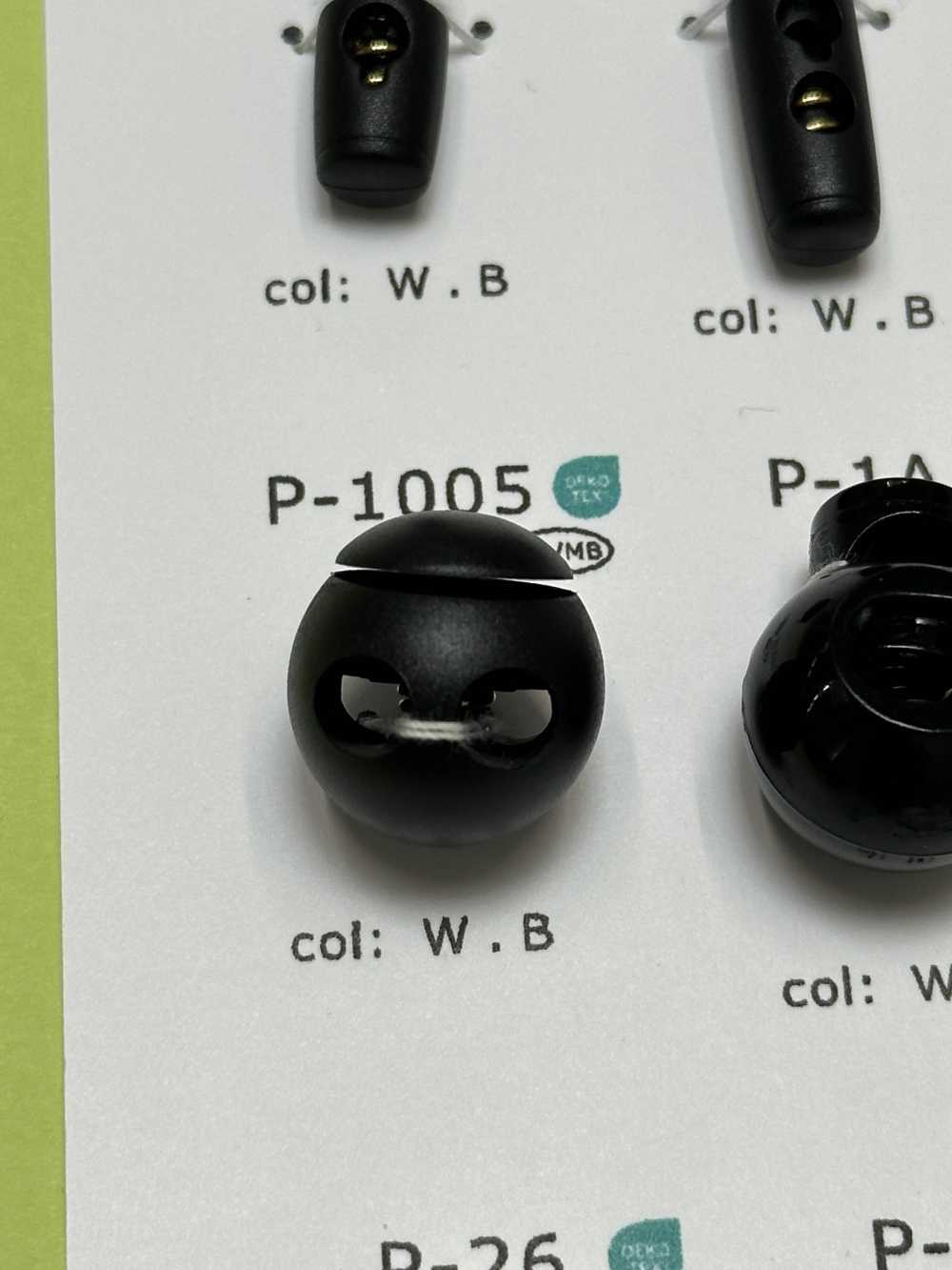 P1005 ナイロン樹脂製 丸型 2つ穴 コードストッパー[バックル・カン類] 大阪プラスチック工業(DAIYA BUTTON)